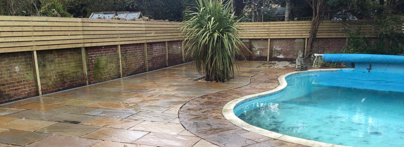 Indian sandstone patio and fence